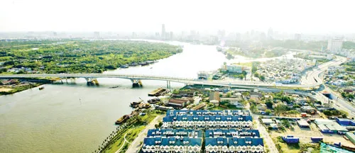 Cầu Thủ Thiêm giúp giảm tình trạng quá tải cho cầu Sài Gòn và góp phần thúc đẩy phát triển kinh tế - xã hội quận 2. Ảnh: LÃ ANH Cầu Thủ Thiêm giúp giảm tình trạng quá tải cho cầu Sài Gòn và góp phần thúc đẩy phát triển kinh tế - xã hội quận 2. Ảnh: LÃ ANH